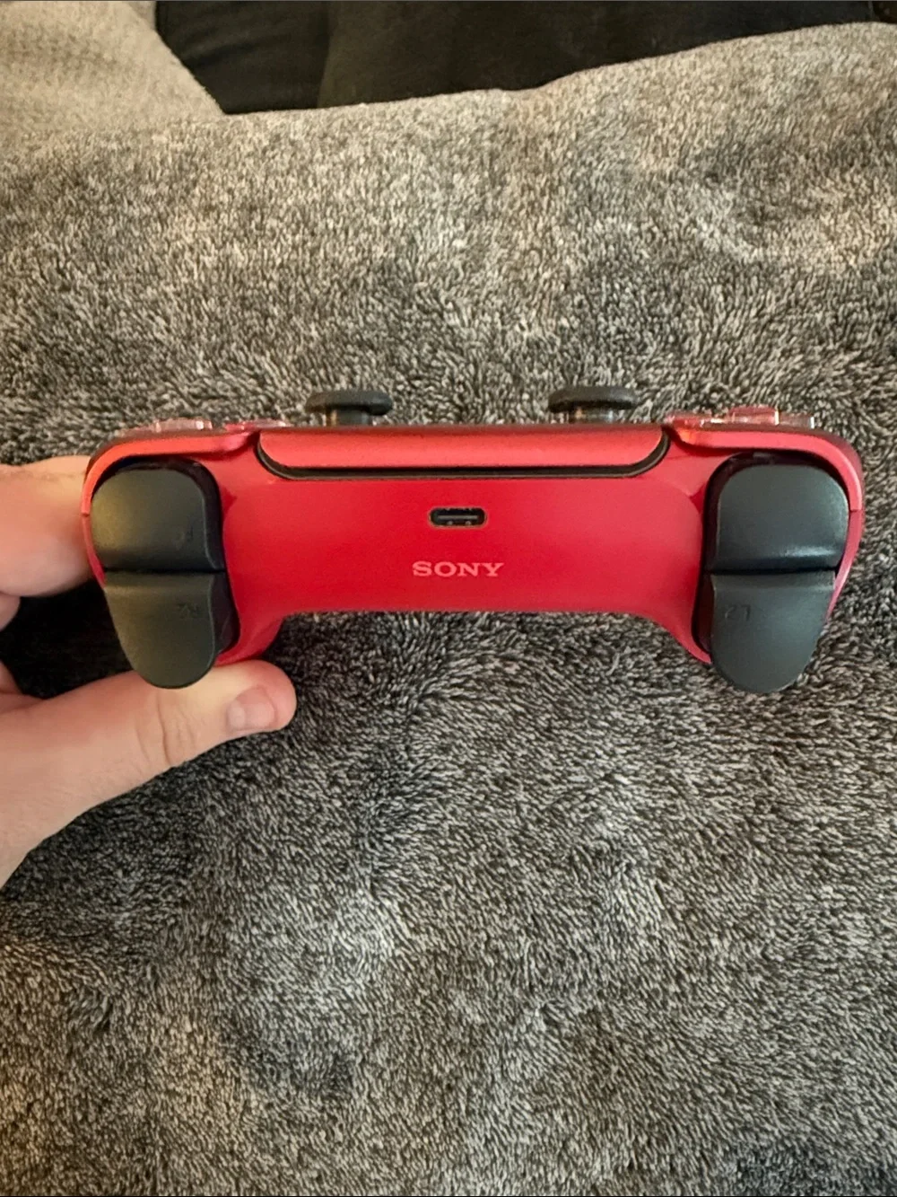 Sony DualSense Wireless Controller in Red and Black